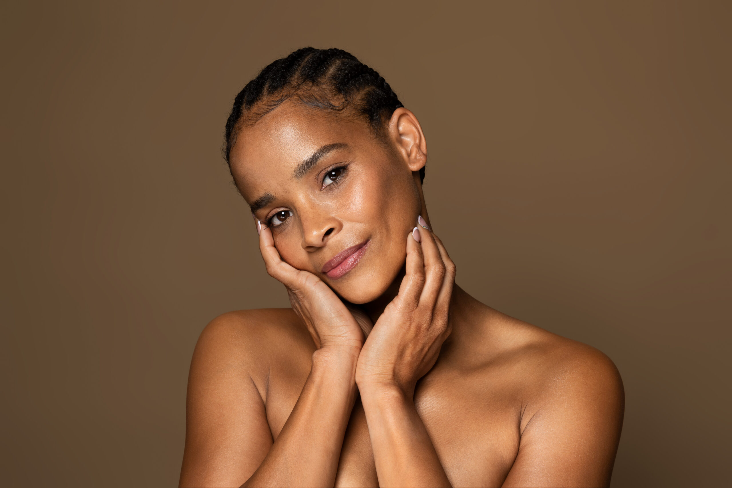 Board-certified dermatologist performing Botox treatment at The Dermatology Group